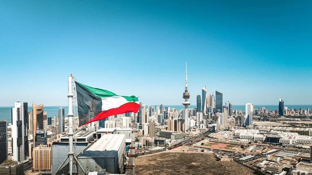 Kuwait skyline with flag